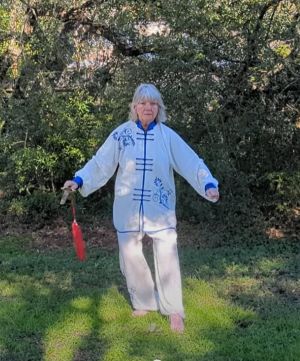 Incorrect: sword is not in front of the body.